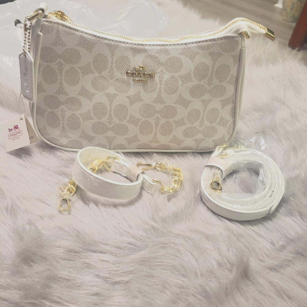 Shoulder Bag In Signature Canvas